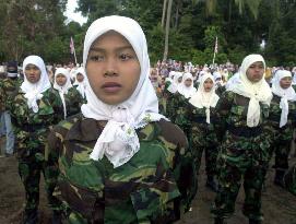 GAM female members gather for flag-raising